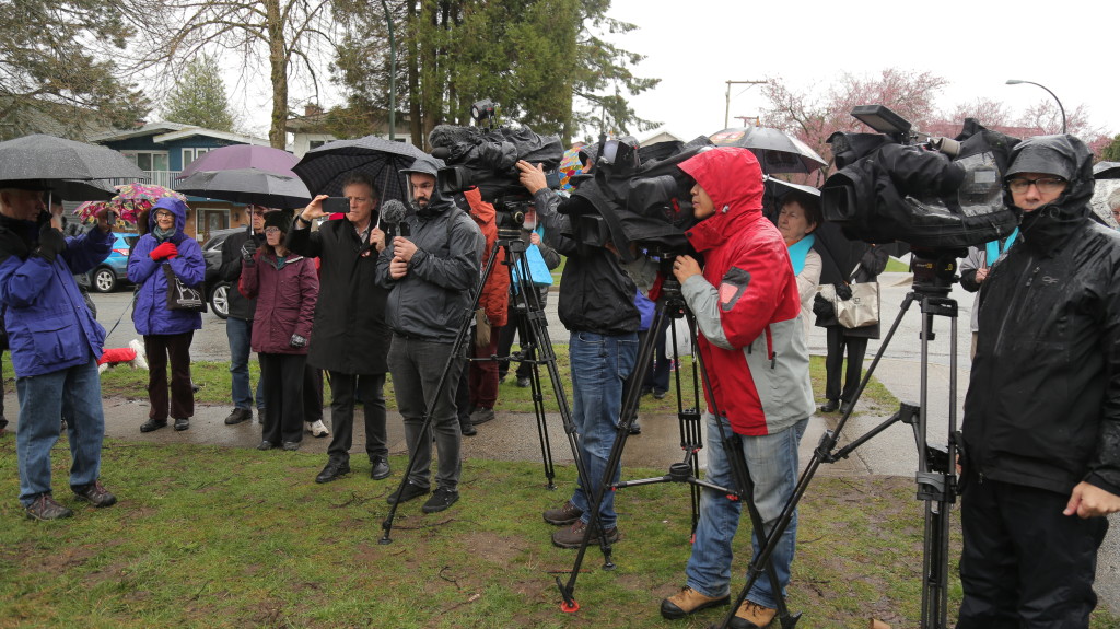 Media attend the ceremony for The Rich Coleman Vacant Lot